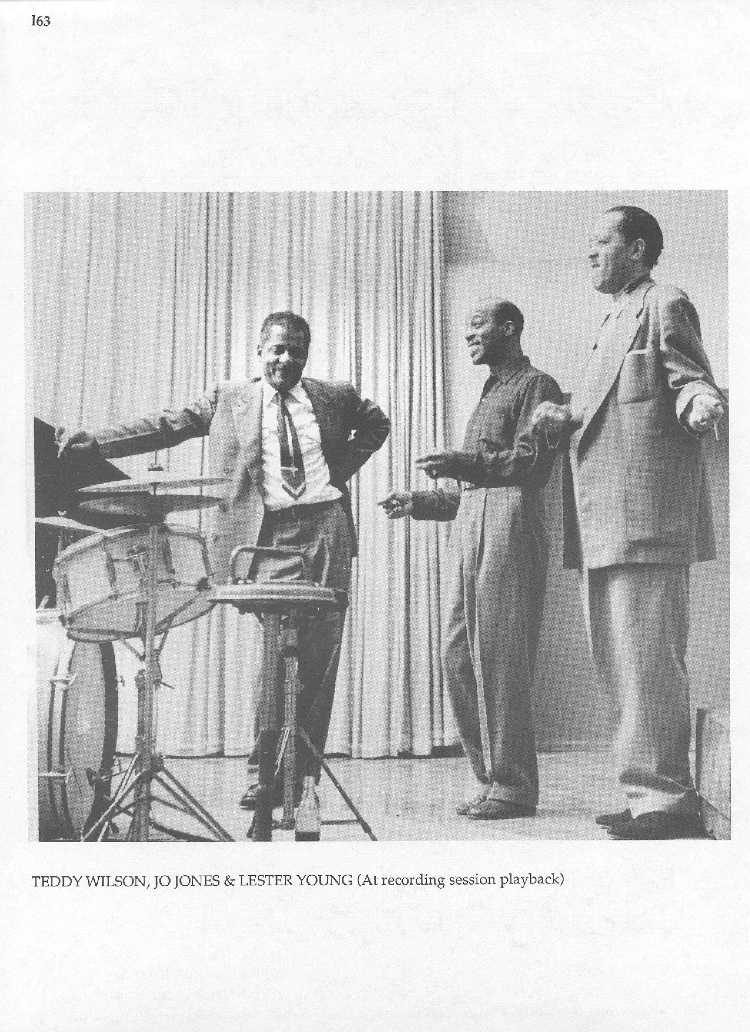 Photo of musicians — Teddy Wilson, Jo Jones & Lester Young (At Recording Session Playback) Photo of musicians — Teddy Wilson, Jo Jones & Lester Young (At Recording Session Playback)